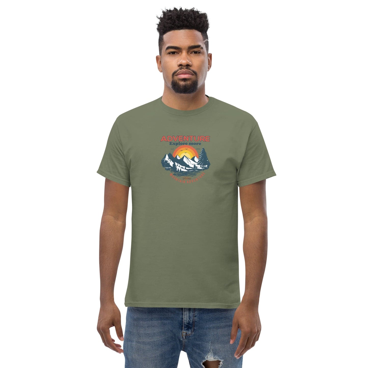 Olive green t-shirt with mountain graphic.